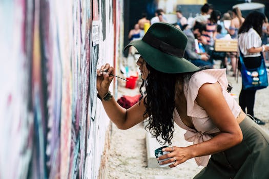 person painting creatively