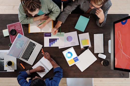 faculty collaborating in a meeting