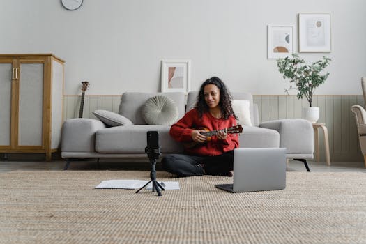 image of a student playing guitar