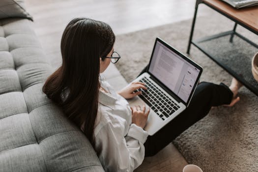 students using laptops for online networking